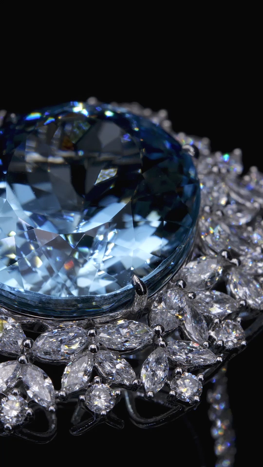 Close-up of hand-setting diamonds on HJ Maison blue diamonds GIA carat